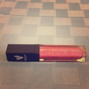 Younique Lucrative Lipgloss NEVER USED